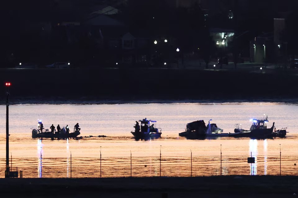 jet hits helicopter, crashes into river